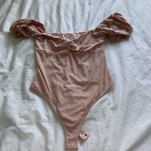 REVOLVE puffed sleeve body suit